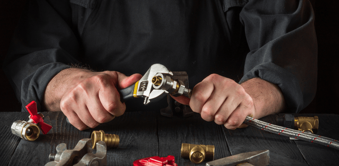 Alabaster, AL Gas logs repair image Alabaster AL Gas Logs Service - Plumber fixing gas line